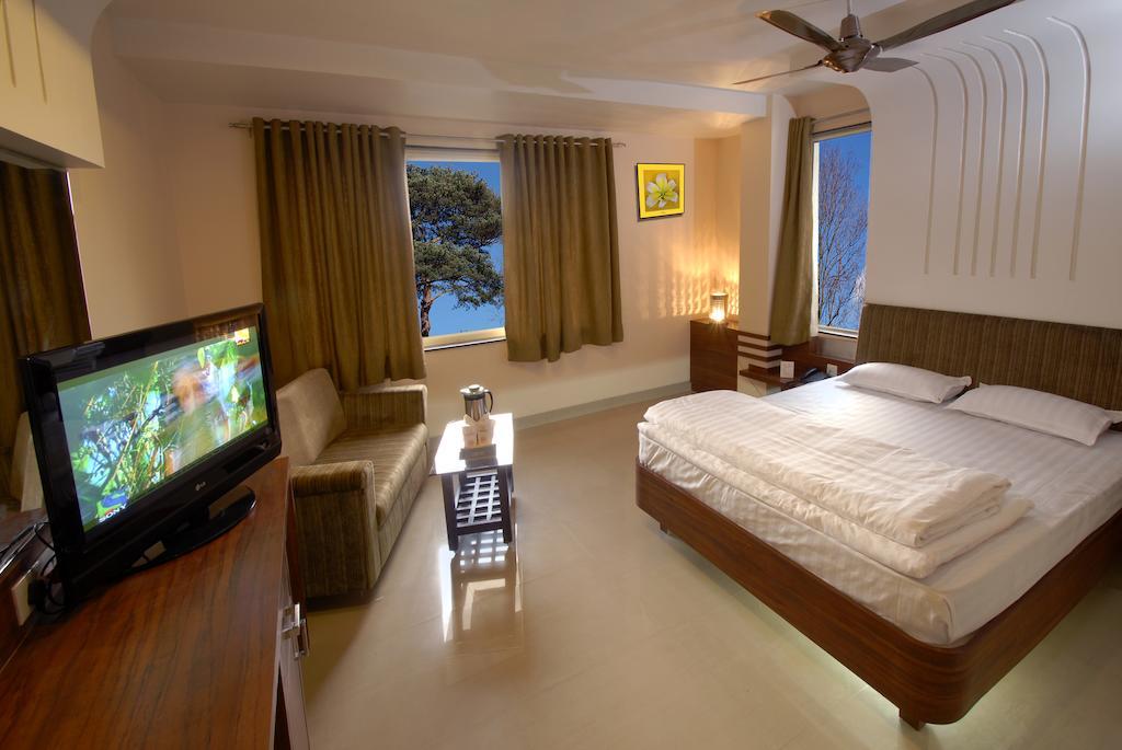 Hotel Tulsi Exotic Бхопал Номер фото